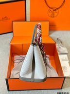 Hermès Taupe Canvas Tote Bag